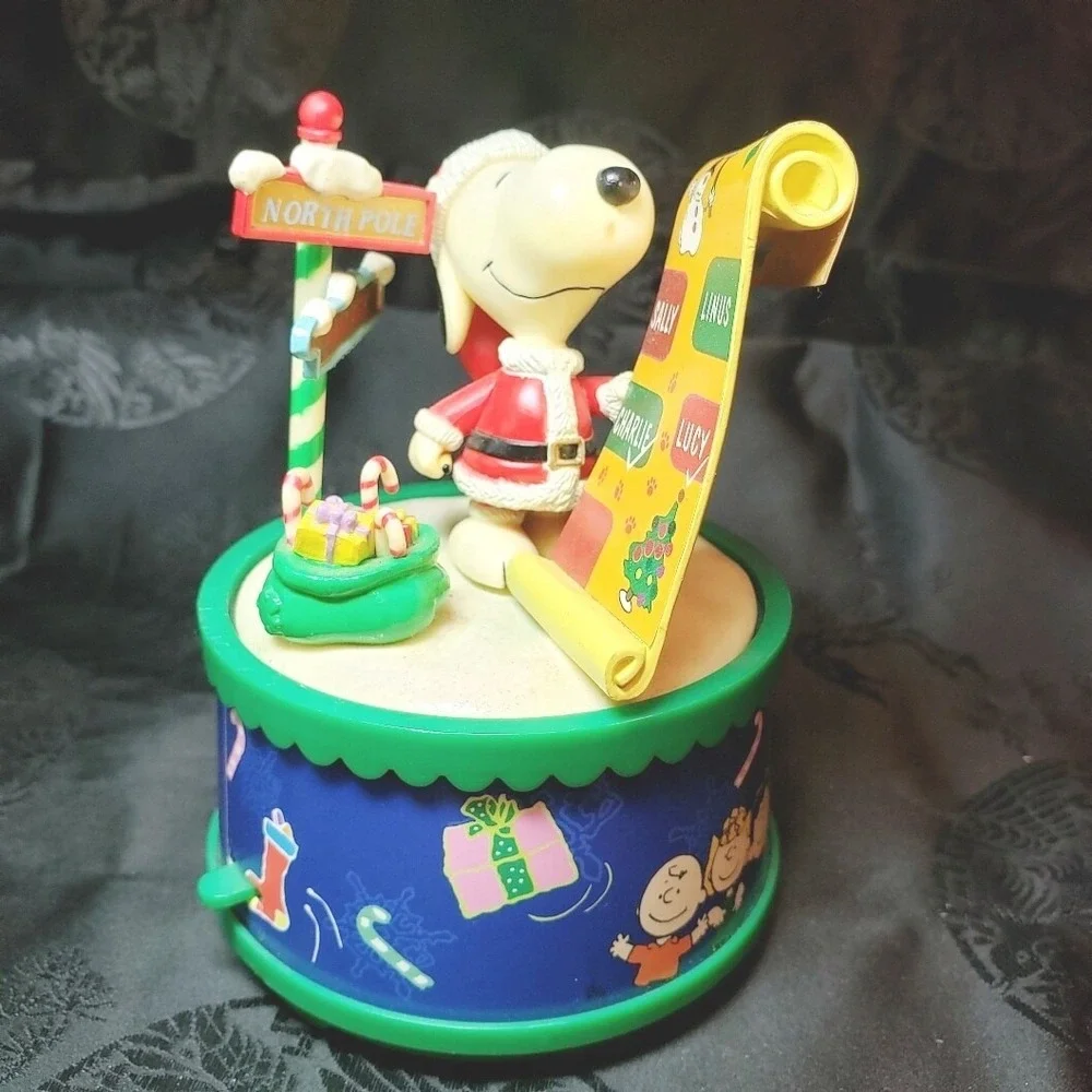 Snoopy as Santa checking his List Music Box Play We Wish You‎ A Merry Christmas